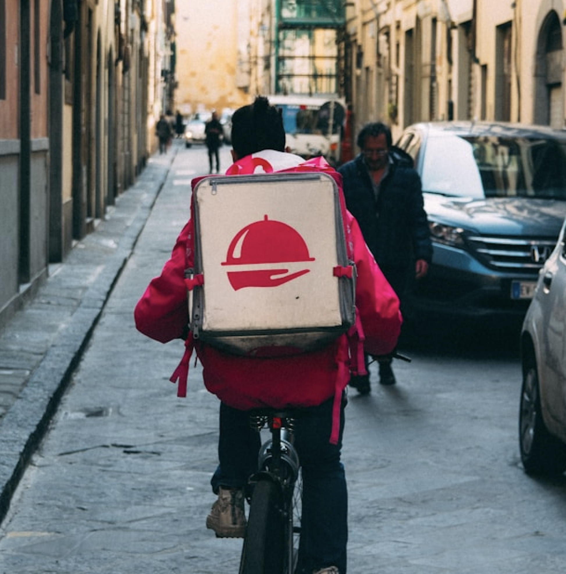 Courier completing a delivery that can carry a branded advertising campaign